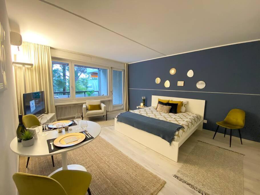 ביסונה Luganersee, Pool, Strand, Parkplatz, Suite מראה חיצוני תמונה