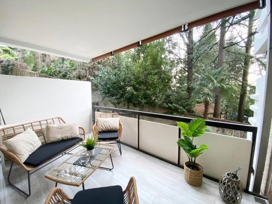ביסונה Luganersee, Pool, Strand, Parkplatz, Suite מראה חיצוני תמונה